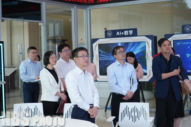 康义赴上海财经大学调研交流